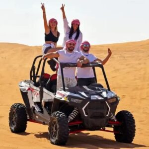 Family taking group photo with 4x4 SUV on Dubai dune bashing tour